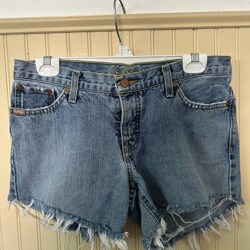 Cruel girl cut off Blue Shorts
